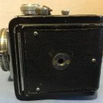 First model tripod socket on bottom of camera.
